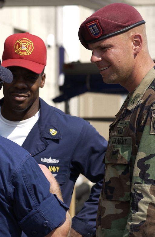 An 82nd Airborne Division soldier works with USS Iwo Jima sailors to pump out the basement of a hospital flooded by Hurricane Katrina in New Orleans in 2005. The U.S. military is ready to provide help to U.S. communities when confronted by disaster, Army Lt. Gen. Jeffrey S. Buchanan, commander of U.S. Army North, said at a Defense Writers’ Group event in Washington, D.C., Oct. 5, 2016. Army photo