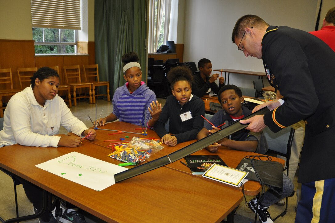 U.S. Army Corps of Engineers, Detroit District’s Deputy District Commander, Scott Snyder instructs students on bridge design at the West Point Society of Michigan Leadership, Ethics and Diversity in STEM conference at Marygrove College. (U.S. Army Corps of Engineers Photo)