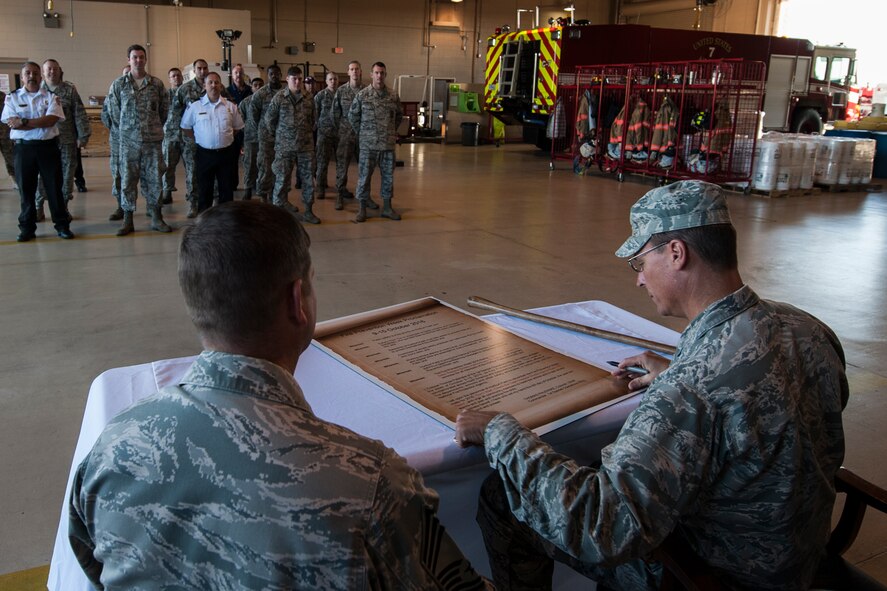 Col. Tom Palenske, commander of the 1st Special Operations Wing, visits Hurlburt’s fire personnel for the signing of the Fire Prevention Week Proclamation at Hurlburt Field, Fla., Oct. 5, 2016. In 1920, President Woodrow Wilson issued the first National Fire Prevention Day proclamation. Since 1922, Fire Prevention Week has been observed on a Sunday through Saturday period in which Oct. 9 falls. (U.S. Air Force photo by Airman 1st Class Joseph Pick)