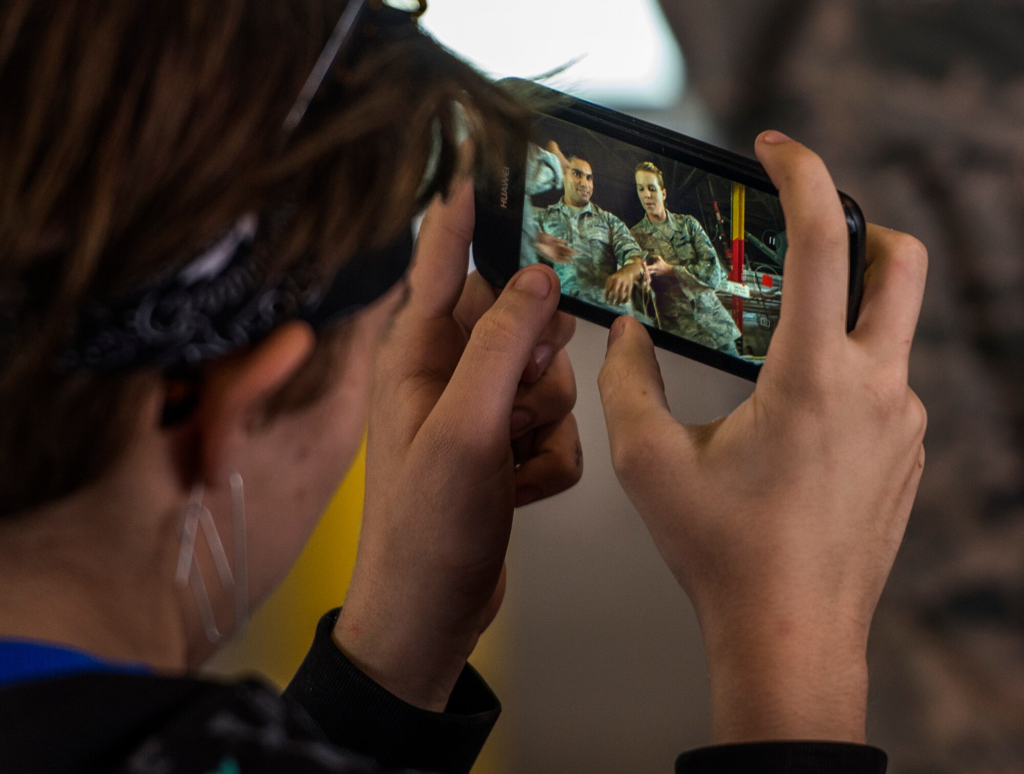 A student records Senior Airman Ryan Singh, 375th MDSS and Senior Master Eva Sgt. Friend, 375th Medical Operations Squadron.