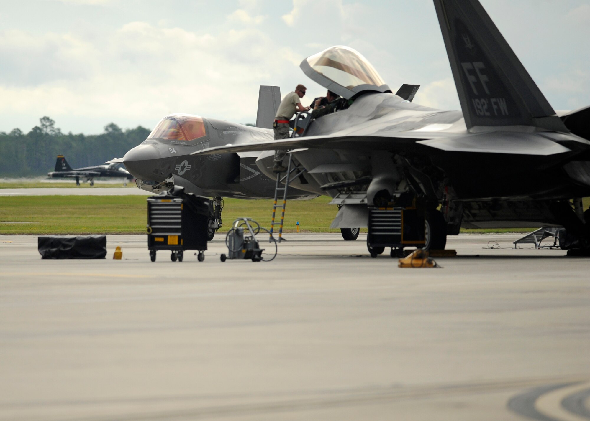 Members of Joint Base Langley-Eustis’ 192nd Fighter Wing and 27th Fighter Squadron work on an F-22 Raptor during Combat Archer, the U.S. Air Force's air-to-air Weapons System Evaluation Program, at Tyndall Air Force Base, Fla., Sept. 16, 2016. During Combat Archer, JBLE Airmen flew 223 sorties and successfully fired 13 missiles. (U.S. Air Force photo by Senior Airman Solomon Cook)
