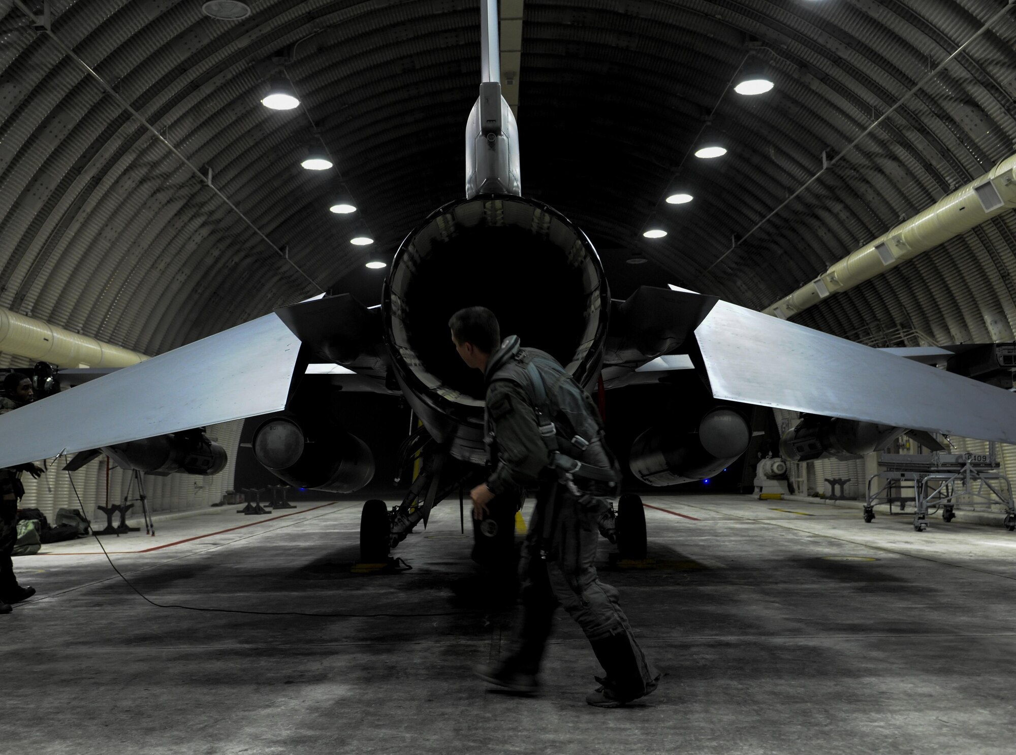 U.S. Air Force Capt. Jacob Houder, 162nd Wing National Guard pilot, conducts a pre-flight inspection of an F-16 Fighting Falcon during Beverly Pack 17-1 at Kunsan Air Base, Republic of Korea, Oct. 4, 2016. The U.S. Air Force and Republic of Korea Air Force provide combat capabilities and training by performing exercises throughout the year to enhance communication and interoperability between military forces so they are prepared to fight as a combined force. (U.S. Air Force photo by Senior Airman Colville McFee/Released) 
