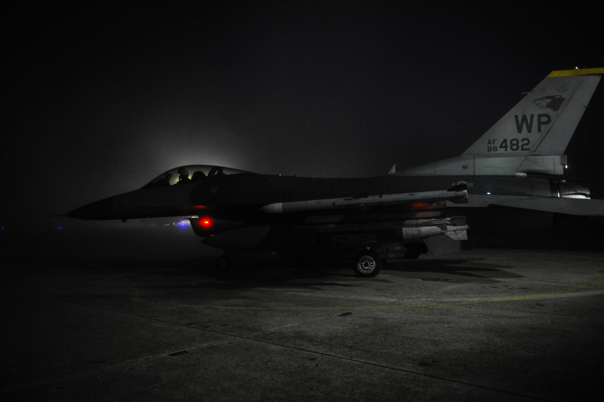 U.S. Air Force Capt. Jacob Houder, 162nd Wing National Guard pilot, parks an F-16 Fighting Falcon from the 8th Fighter Wing outside of its hanger bay during Beverly Pack 17-1 at Kunsan Air Base, Republic of Korea, Oct. 4, 2016. The U.S. Air Force and Republic of Korea Air Force provide combat capabilities and training by performing exercises throughout the year to enhance communication and interoperability between military forces so they are prepared to fight as a combined force. (U.S. Air Force photo by Senior Airman Colville McFee/Released) 
