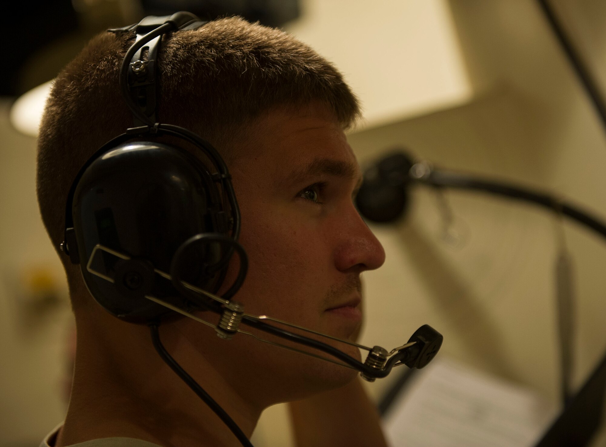 Staff Sgt. Shane Stilson, 91st Missile Maintenance Squadron periodic maintenance team chief, communicates with his above-ground team members at the A-09 launch facility in the missile complex, N.D., Sept. 7, 2016. Communication allows the team to work together from all around the facility to complete the mission. (U.S. Air Force photo/Senior Airman Apryl Hall)
