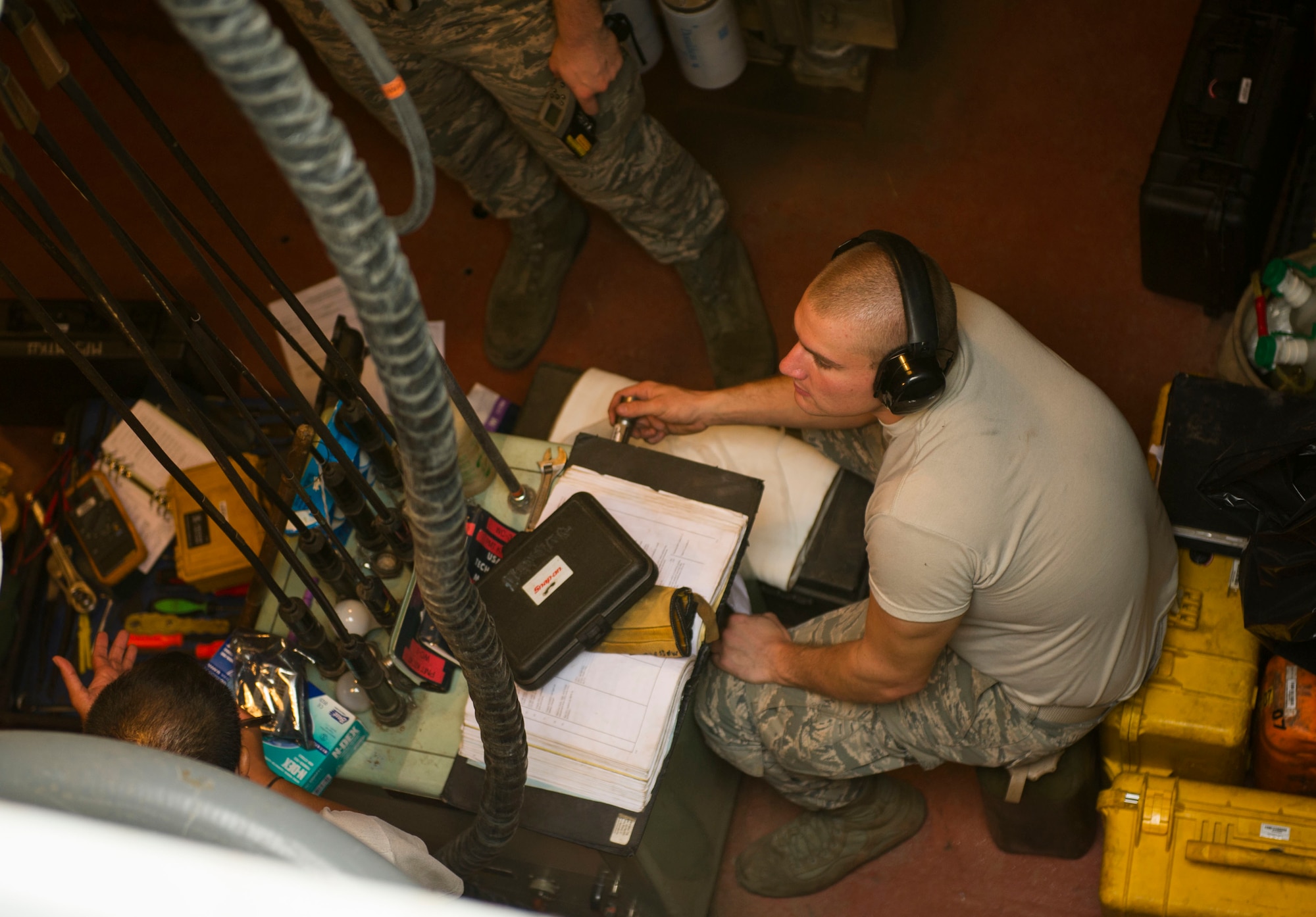Airman 1st Class Stephen Stoll, 91st Missile Maintenance Squadron periodic maintenance team technician, checks the functionality of a diesel engine at the A-09 launch facility in the missile complex, N.D., Sept. 7, 2016. PMT members are responsible for the upkeep of launch facilities, missile alert facilities and launch control centers. (U.S. Air Force photo/Senior Airman Apryl Hall)