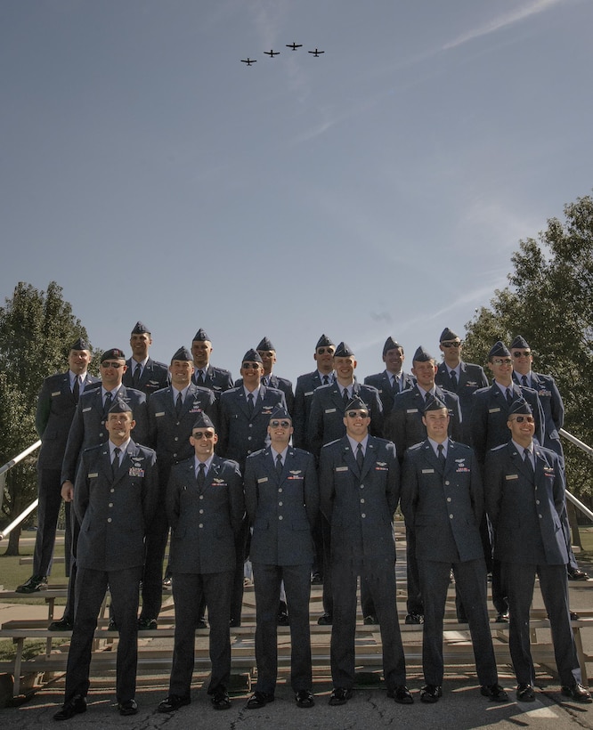 Specialized Undergraduate Pilot Training Class 16-15 gathers for a group photo at Vance Air Force Base, Oklahoma, Sept. 30. After approximately one year of rigorous instruction, these pilots will now move on to train on a variety of airframes. (U.S. Air Force photo by David Poe)