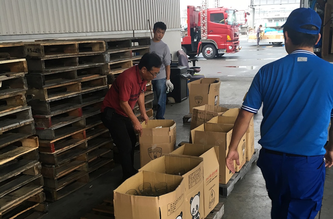 Receivers at DLA Disposition Services at Iwakuni, Japan, process items from the Marine Corps’ old Temporary Lodging Facility there. 