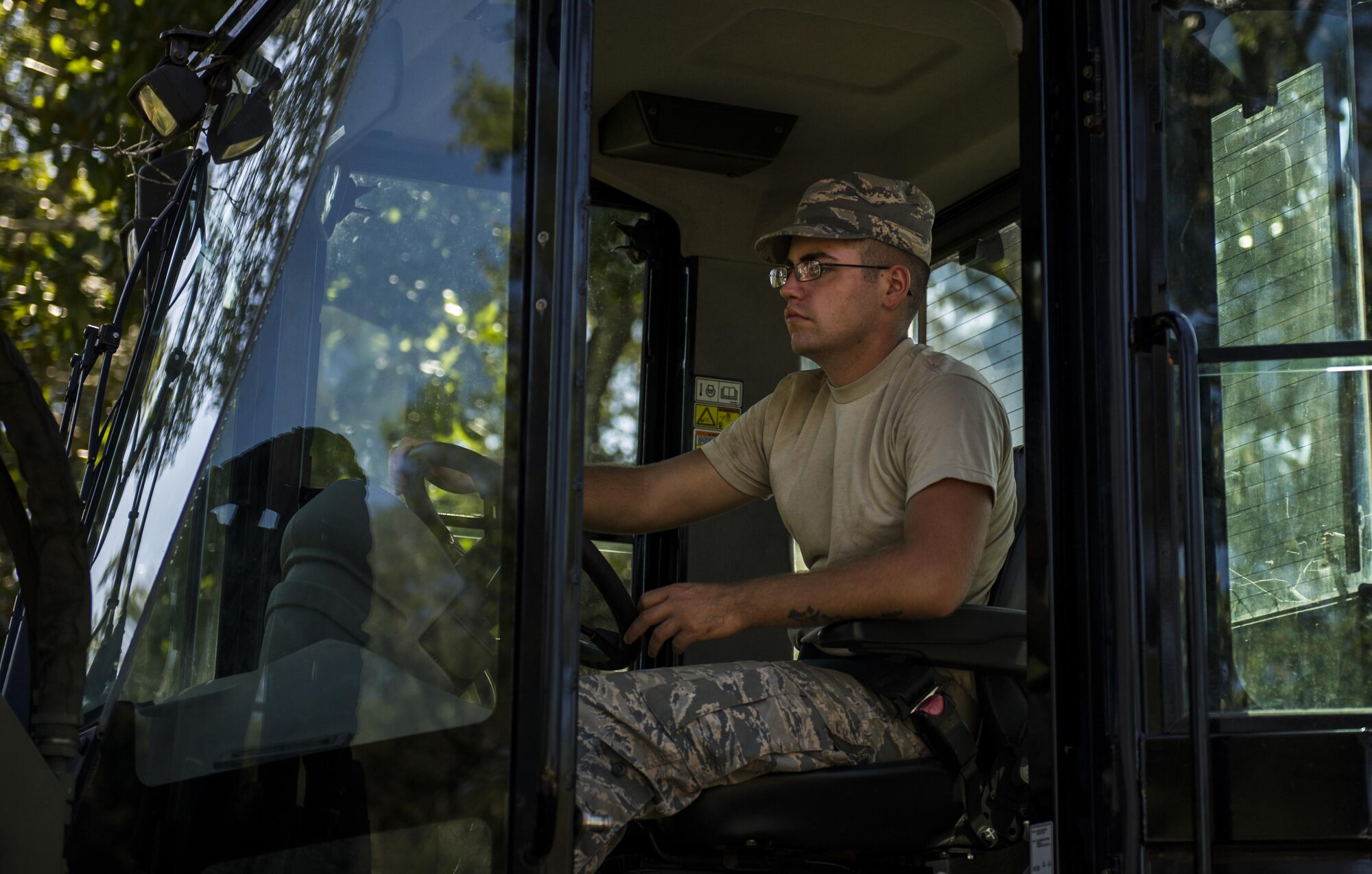 Senior Airman David Asbury, a pavement and heavy equipment specialist with the 1st Special Operations Civil Engineer Squadron, operates a forklift at Hurlburt Field, Fla., Oct. 4, 2016. Pavement and heavy equipment specialists are responsible for inspecting, constructing and repairing airfield pavements, roads, streets, curbs, surface mats and other areas using paving and surfacing procedures. (U.S. Air Force photo by Airman 1st Class Joseph Pick)