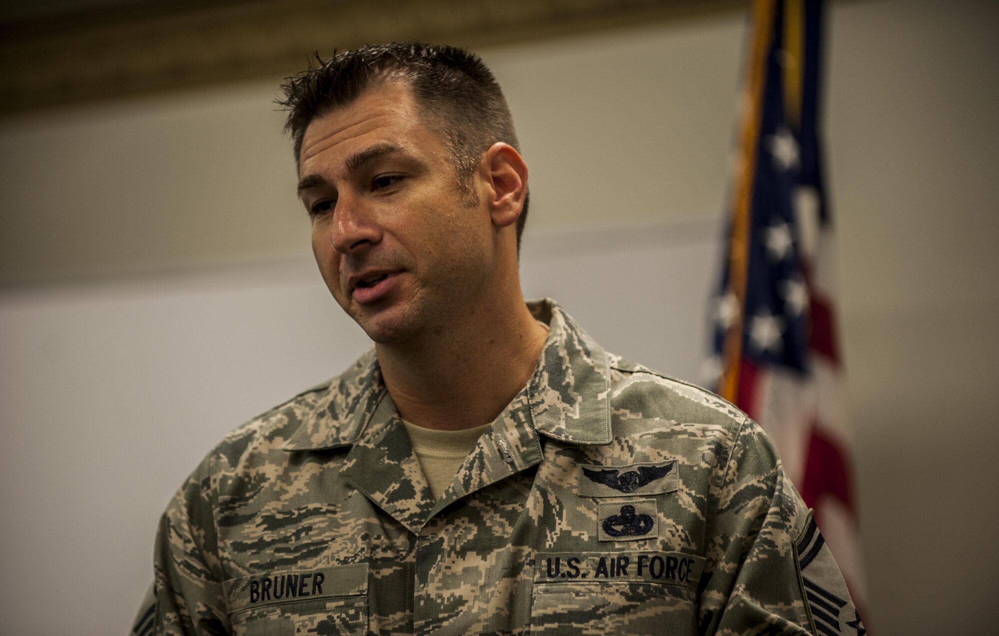 Senior Master Sgt. Brandon Bruner, career assistant advisor with the Air Force Special Operations Command, briefs Air Commandos in the Hurlburt Airman’s Voice meeting on retraining and cross-training requirements at Hurlburt Field, Fla. Sept 27, 2016. Career assistant advisors ensure professional development for all Airmen and also career counseling for Airmen interested in career changes and anything pertaining to their career. 