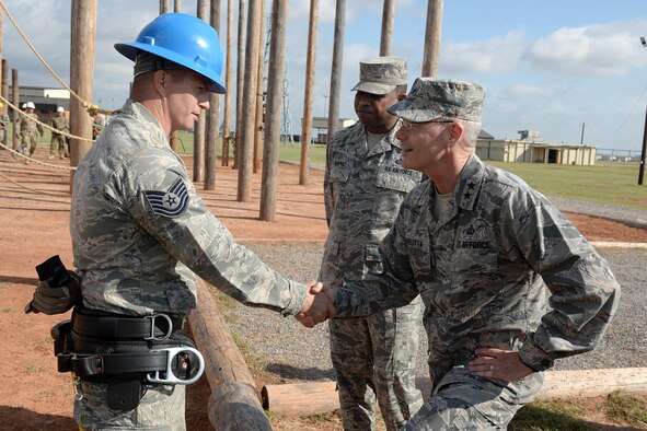 Tech. Sgt. Nicholas Hallman, 364th Training Squadron instructor, speaks with Maj. Gen. Robert Labrutta, 2nd Air Force commander, during his immersion tour with the 82nd Training Wing at Sheppard Air Force Base, Texas, Oct. 4, 2016. Labrutta toured the base and held an all call for Airmen to share his leadership philosophy and motivational stories. (U.S. Air Force photo by Senior Airman Kyle E. Gese)