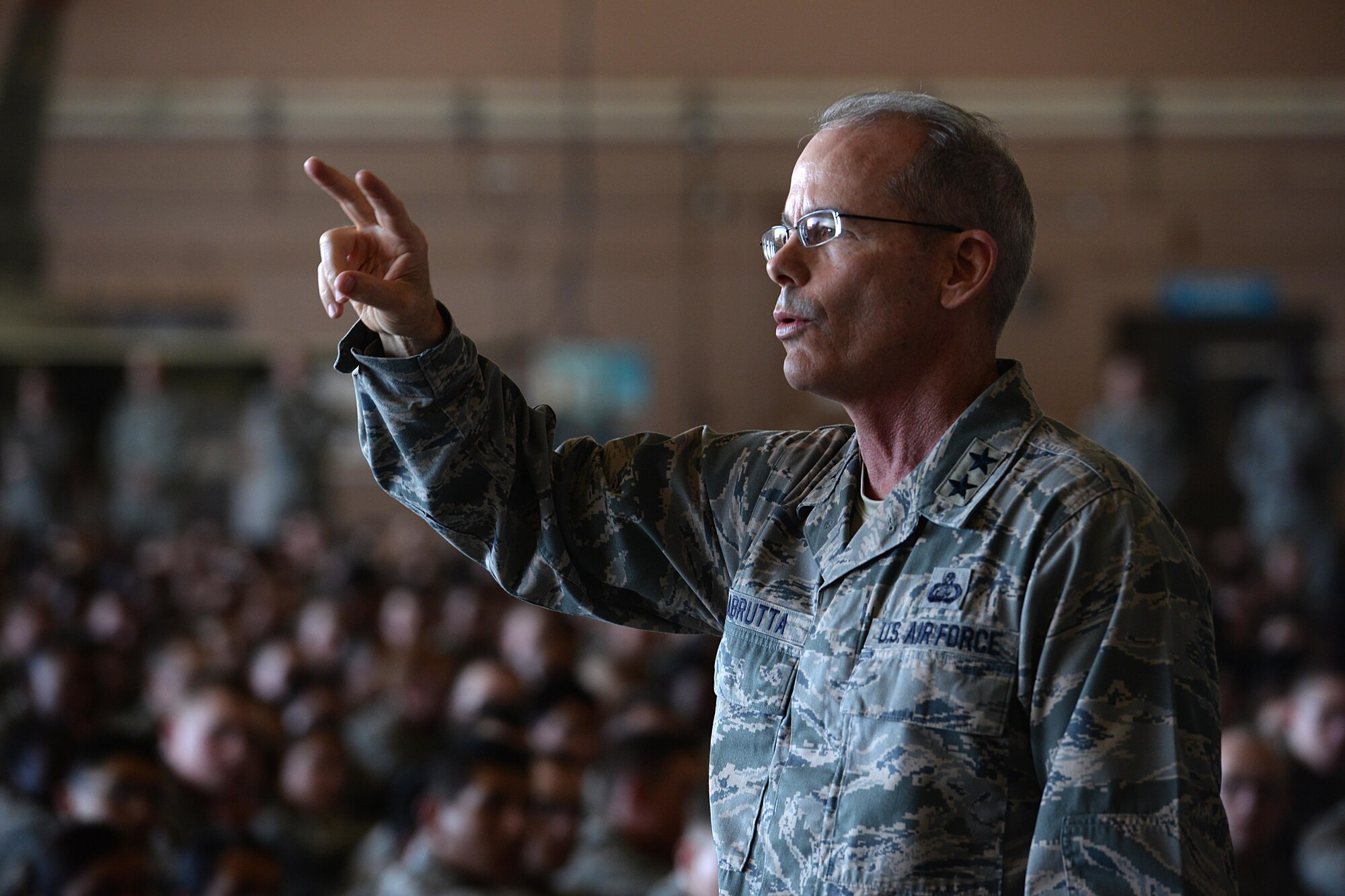 Maj. Gen. Robert Labrutta, 2nd Air Force commander, speaks to Airmen at Sheppard Air Force Base, Texas, during an all call, Oct. 4, 2016. During the all call, Labrutta shared his personal story and leadership philosophy with Airmen and challenged them to be better than the person who came before them. (U.S. Air Force photo by Senior Airman Kyle E. Gese)