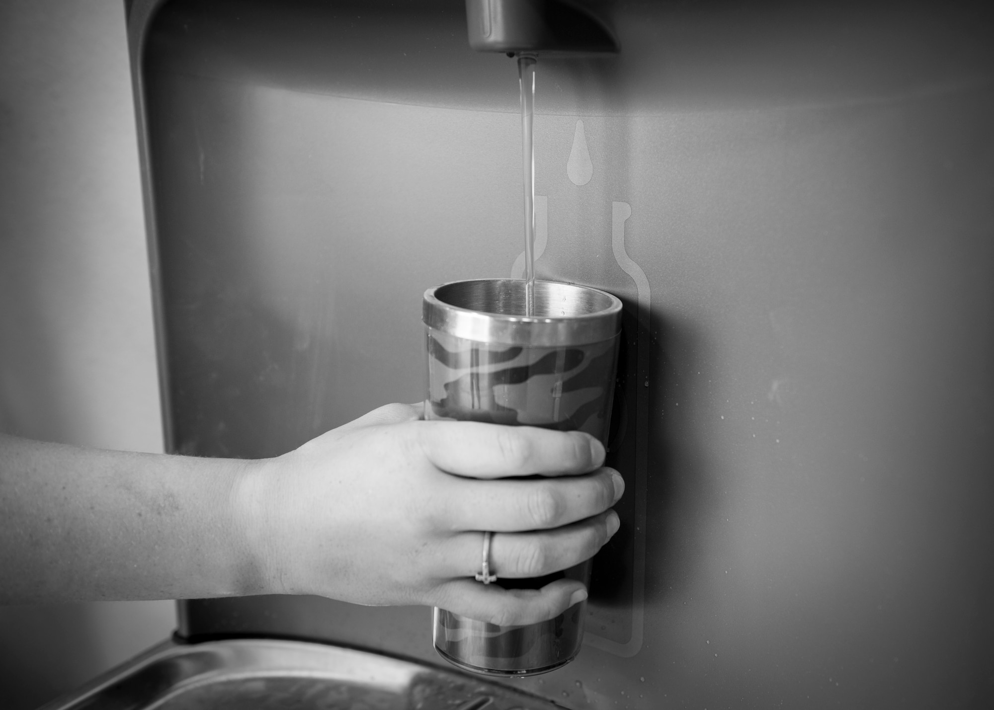 Senior Airman Markita Andrews, a water and fuels systems maintenance journeyman, checks to ensure the newly installed drinking fountain works properly at the RED HORSE compound on Hurlburt Field, Fla., Oct. 3, 2016. The newly installed fountain will be equipped with a bottle filling station that provides a clean fill with minimal splash. (U.S. Air Force photo by Senior Airman Krystal M. Garrett)