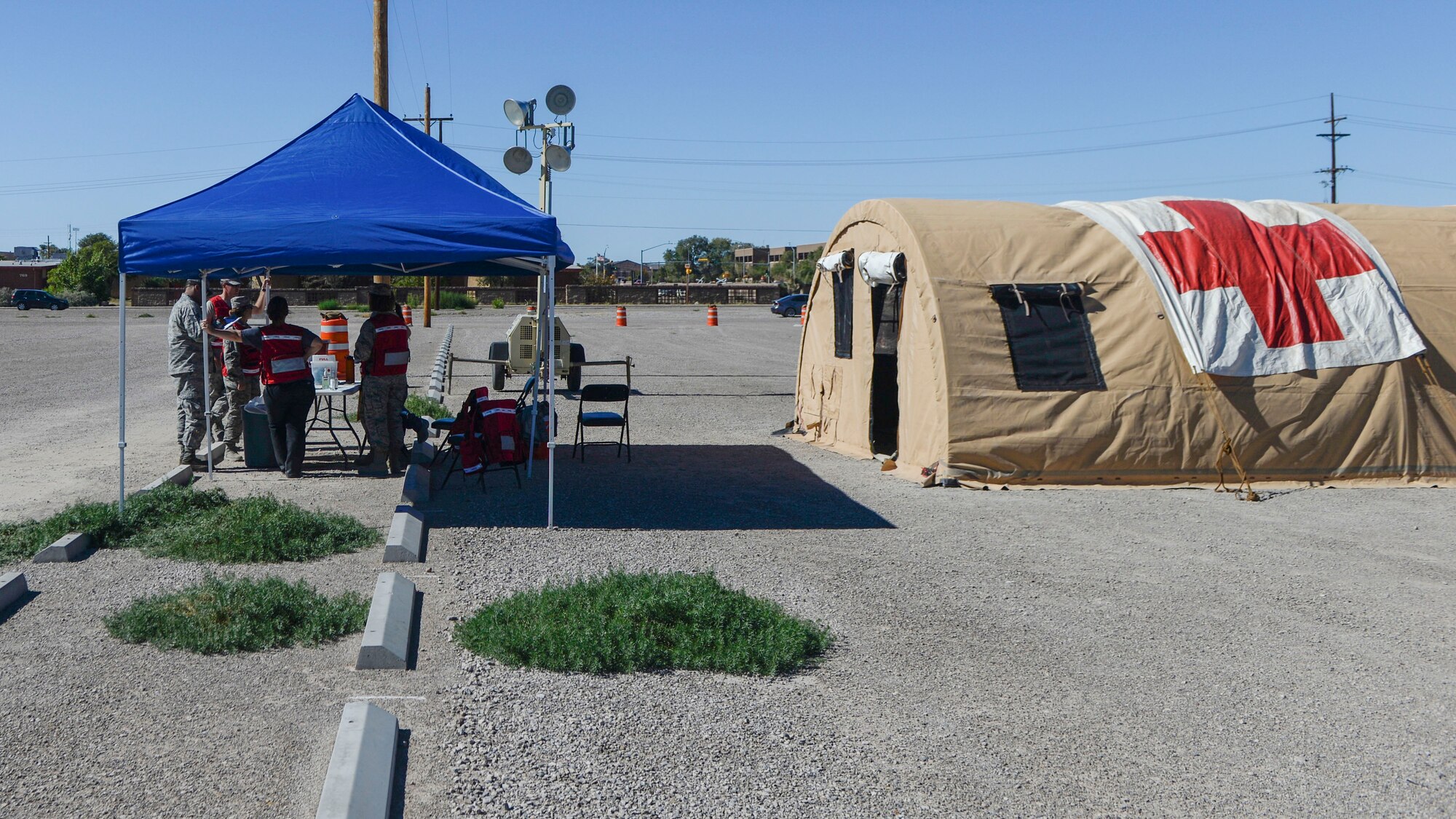 A group of 49th Medical Group staff members get feedback from an Airman during the base’s drive-thru immunization clinic Oct. 4, 2016. The 49th MDG set up the drive-thru clinic, with two stations, to make it easier for active duty Airmen to obtain their annual flu shot. The influenza vaccine was administered via injection. The 49th MDG staff administered the influenza vaccine to 720 Airmen throughout the duty-day. (U.S. Air Force photo by Airman 1st Class Alexis P. Docherty)