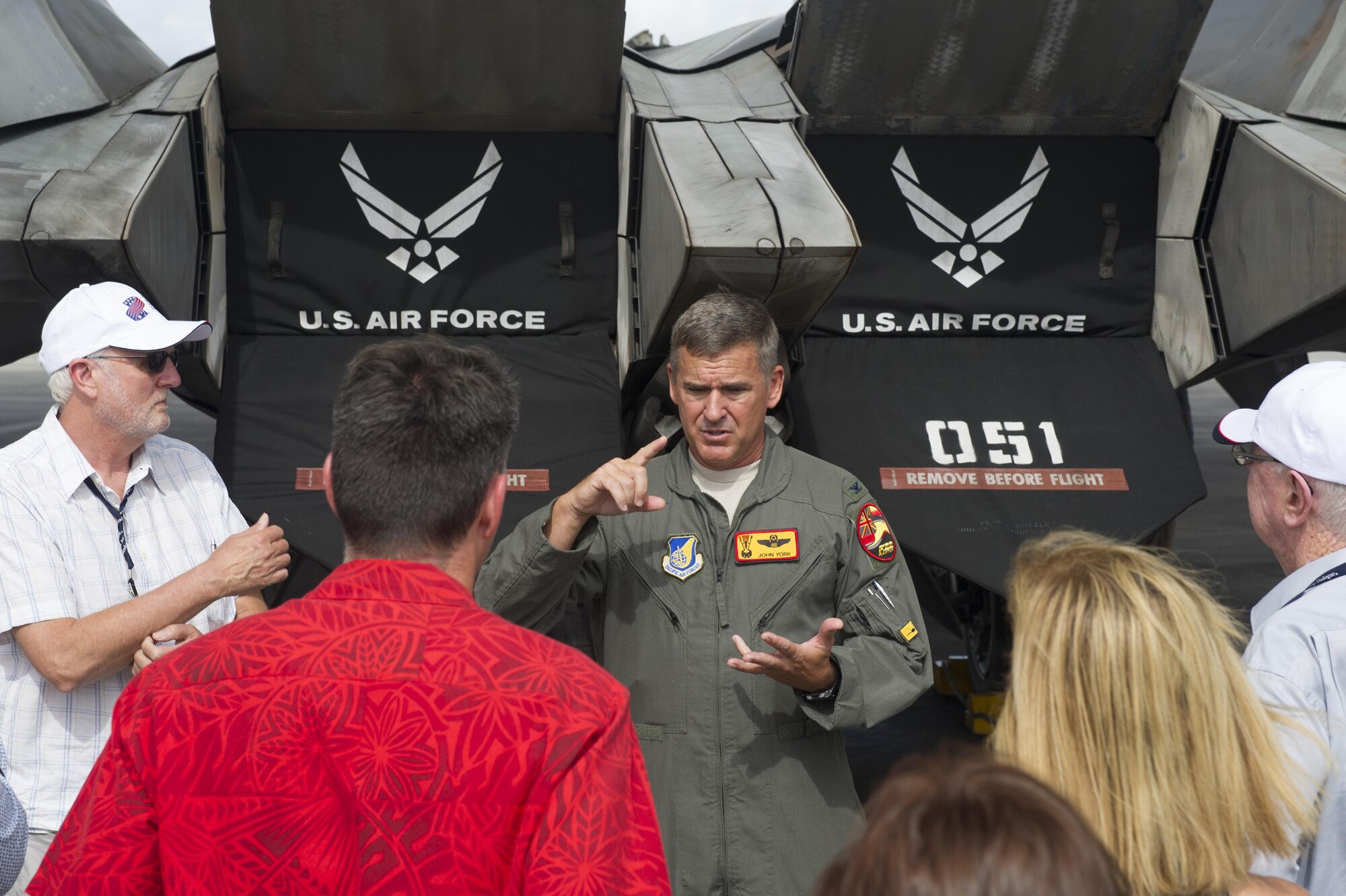 U.S. Air Force Col. John York, Hawaii Air National Guard 154th Oprations Group commander, discusses the capabilities of the F-22 Raptor to delegates of the Australian American Leadership Dialogue (AALD) during their visit to Joint Base Pearl Harbor-Hickam, Hawaii, Oct. 4, 2016. The AALD brings together U.S. and Australian leaders from government, enterprise, media, education and the community to build upon and improve bilateral relations. This year is the 9th Annual Honolulu Leadership Dialogue co-hosted by U.S. Pacific Command and the East-West Center. (U.S. Air Force photo by Staff Sgt. Alexander Martinez)