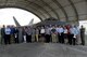 Delegates of the Australian American Leadership Dialogue (AALD) and Pacific Air Forces members pose for a photo in front of an F-22 Raptor during the delegation's visit to Joint Base Pearl Harbor-Hickam, Hawaii, Oct. 4, 2016. The AALD brings together U.S. and Australian leaders from government, enterprise, media, education and the community to build upon and improve bilateral relations. This year is the 9th Annual Honolulu Leadership Dialogue co-hosted by U.S. Pacific Command and the East-West Center. (U.S. Air Force photo by Staff Sgt. Alexander Martinez)