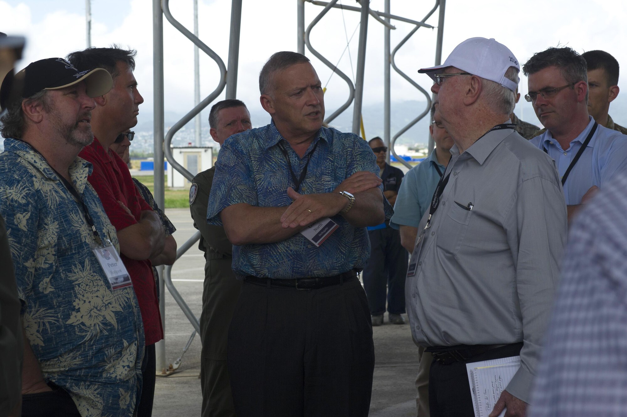 U.S. Air Force retired Gen. Gary North, former Pacific Air Forces commander, discusses the capabilities of the F-22 Raptor to delegates of the Australian American Leadership Dialogue (AALD) during their visit to Joint Base Pearl Harbor-Hickam, Hawaii, Oct. 4, 2016. The AALD brings together U.S. and Australian leaders from government, enterprise, media, education and the community to build upon and improve bilateral relations. This year is the 9th Annual Honolulu Leadership Dialogue co-hosted by U.S. Pacific Command and the East-West Center. (U.S. Air Force photo by Staff Sgt. Alexander Martinez)