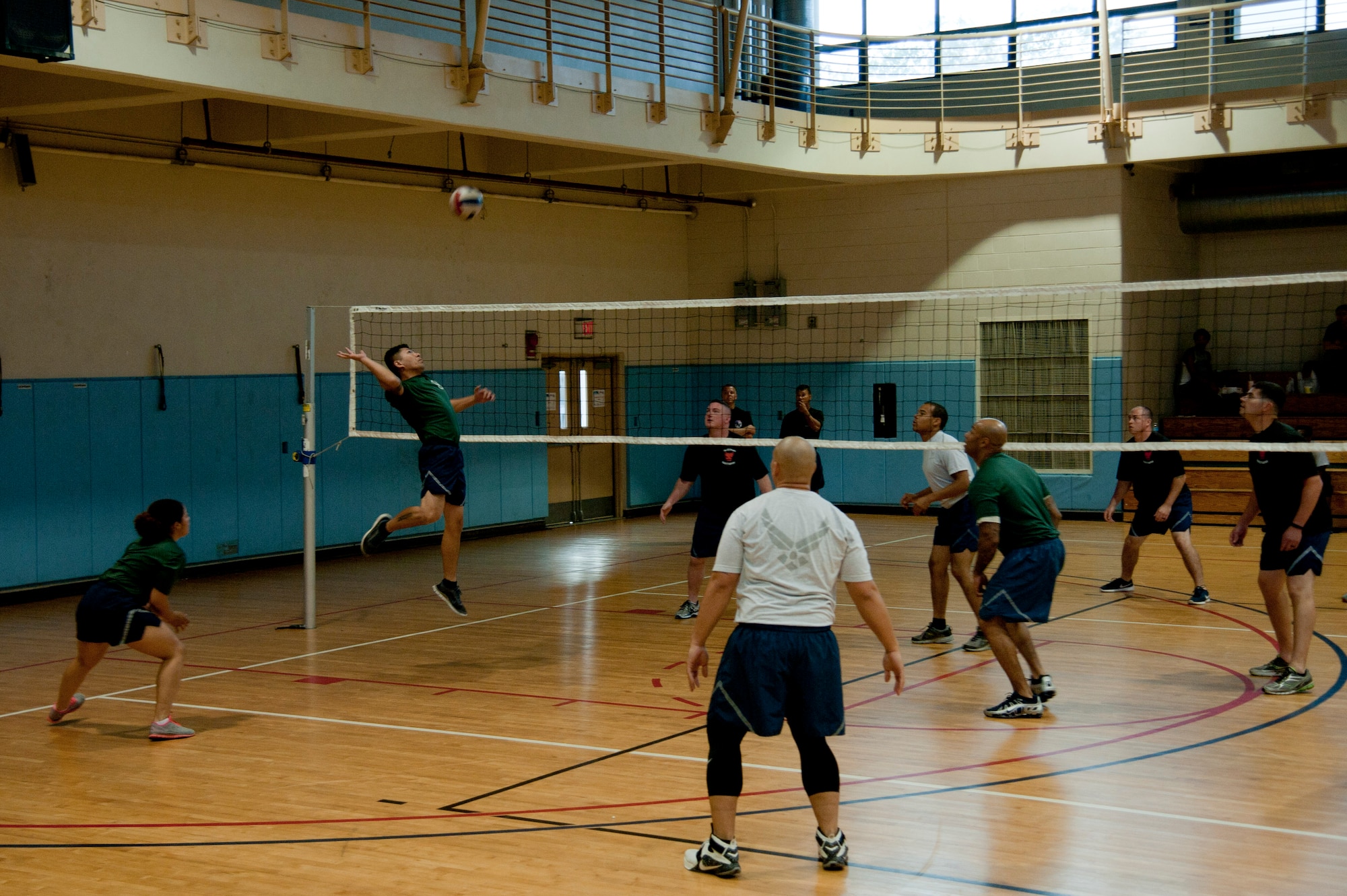 A member from 51st Civil Engineer Squadron goes for a spike while playing agianst the 51st Security Force Squardon in a volleyball game during Osan Cup 2016 at Osan Air Base, Republic of Korea, Sept. 29, 2016. Osan Cup allowed units to work and compete together in a variety of sporting events. (U.S. Air Force photo by Staff Sgt. Jonathan Steffen) 