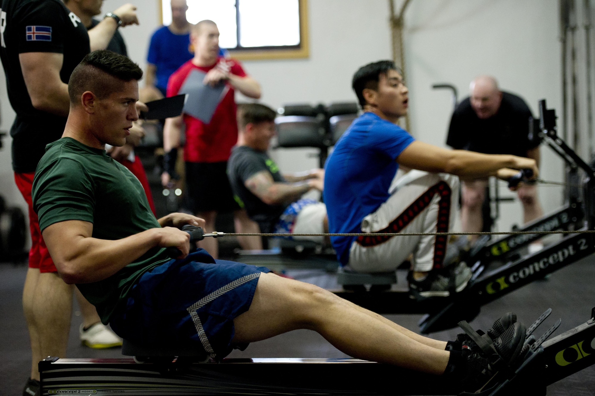 Team Osan members compete in a crossfit challenge during Osan Cup 2016 at Osan Air Base, Republic of Korea, Sept. 29, 2016. Osan Cup allowed units to work and compete together in a variety of sporting events. (U.S. Air Force photo by Staff Sgt. Jonathan Steffen)