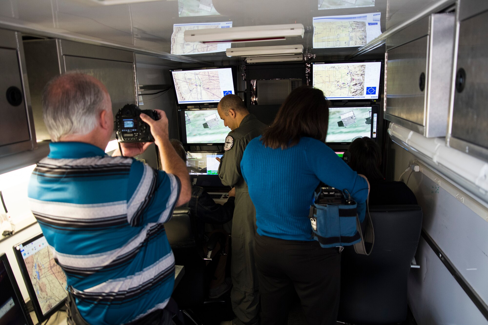 Members of the local media experience flying a remotely piloted aircraft in the 188th Wing’s RPA simulator, Sept. 29, 2016, at Ebbing Air National Guard Base, Fort Smith, Ark. Prior to viewing the simulator, the local media was informed of the activation of its RPA, intelligence analysis and targeting missions. (U.S. Air National Guard photo by Tech. Sgt. Chauncey Reed)