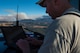 Lt. Col. Shawn Scott, distributed real-time infrared program manager, emails data files to interagency firefighting commanders at the incident command post on the Soberanes Fire in Monterey County, California Aug. 02, 2016. The files sent are used to update, near real time, fire perimeter maps. This near real time data is one of the benefits of the DRTI mission. (U.S. Air National Guard photo by Tech. Sgt. Joshua C. Allmaras)