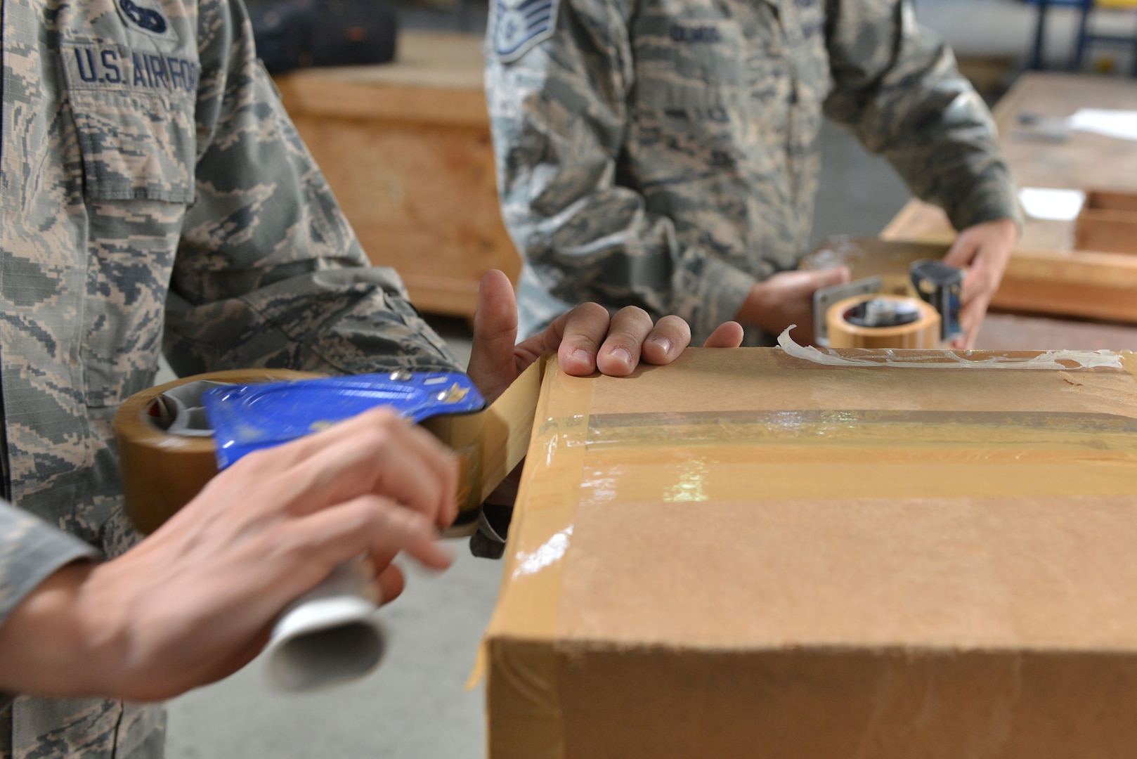 U.S. Air Force Airman 1st Class Daniel Josephson (left), 39th Logistics Readiness Squadron (LRS) traffic management journeyman and Staff Sgt. Amanda Olmos, 39th LRS outbound cargo noncommissioned officer in charge, prepare boxes for shipment Sept. 29, 2016, at Incirlik Air Base, Turkey. Cargo is packaged and accounted for prior to being transported. (U.S. Air Force photo by Senior Airman John Nieves Camacho)