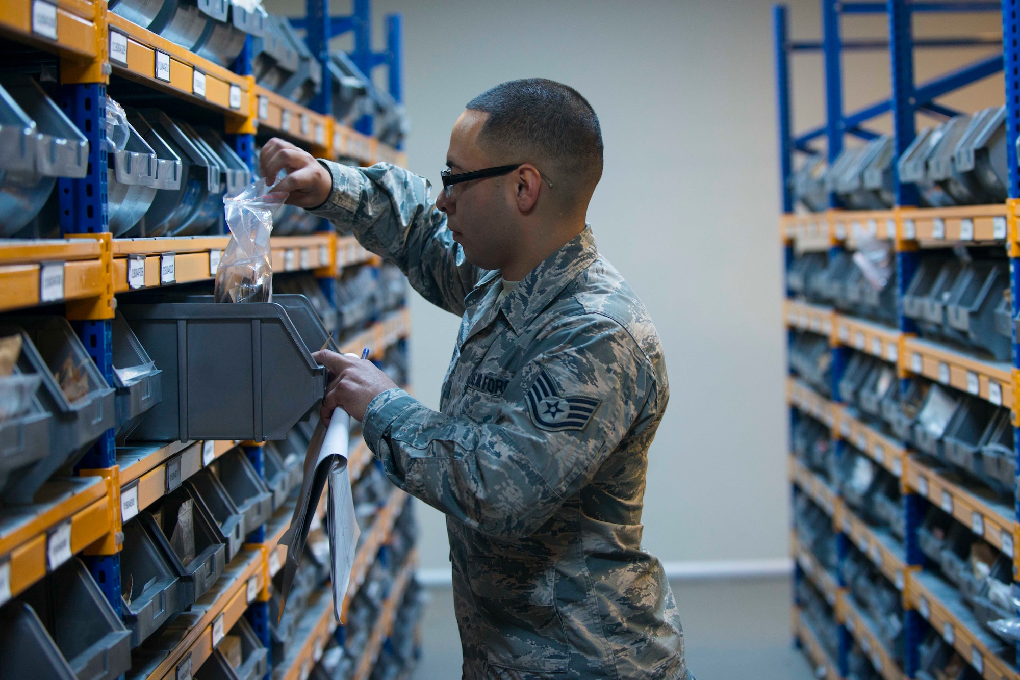 U.S. Air Force Staff Sgt. Ray Medrano, 39th Logistics Readiness Squadron central storage NCO in charge, inspects shelf life items in the supply warehouse Oct. 4, 2016, at Incirlik Air Base, Turkey. Supply Airmen keep accountability of resources and equipment and distribute items required for mission accomplishment across the base. (U.S. Air Force photo by Senior Airman John Nieves Camacho)