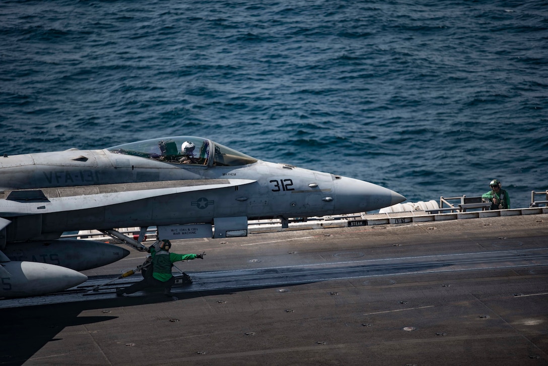 ARABIAN GULF (Oct. 5, 2016) An F/A-18C Hornet assigned to the Wildcats of Strike Fighter Squadron (VFA) 131 prepares to launch off of the flight deck of the aircraft carrier USS Dwight D. Eisenhower (CVN 69) (Ike). Ike and its Carrier Strike Group are deployed in support of Operation Inherent Resolve, maritime security operations and theater security cooperation efforts in the U.S. 5th Fleet area of operations. (U.S. Navy photo by Seaman Christopher A. Michaels)