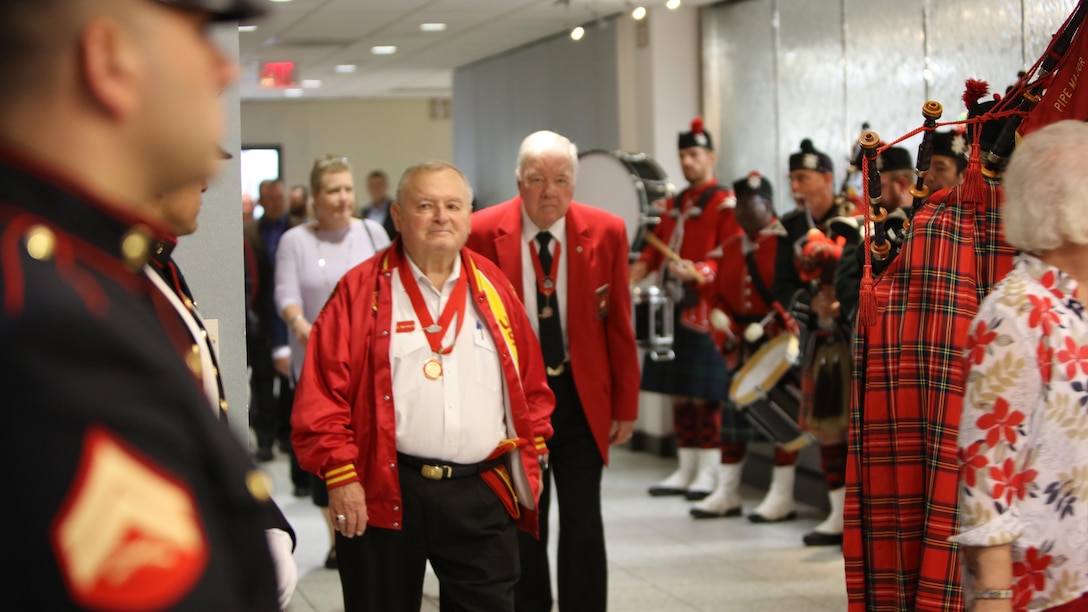 Veterans and members of the Semper Fi Society of St. Louis admire Marines in the color guard as they enter the room for the 7th Annual Gold Star Luncheon in St. Louis, Mo., Oct. 1, 2016. Sgt. Taylor Woods, Sgt. John Jaimes, Cpl. Matthew Huckabee and Cpl. Jeremy Patania from 3rd Battalion, 23rd Marine Regiment, formed the color guard for the event. 