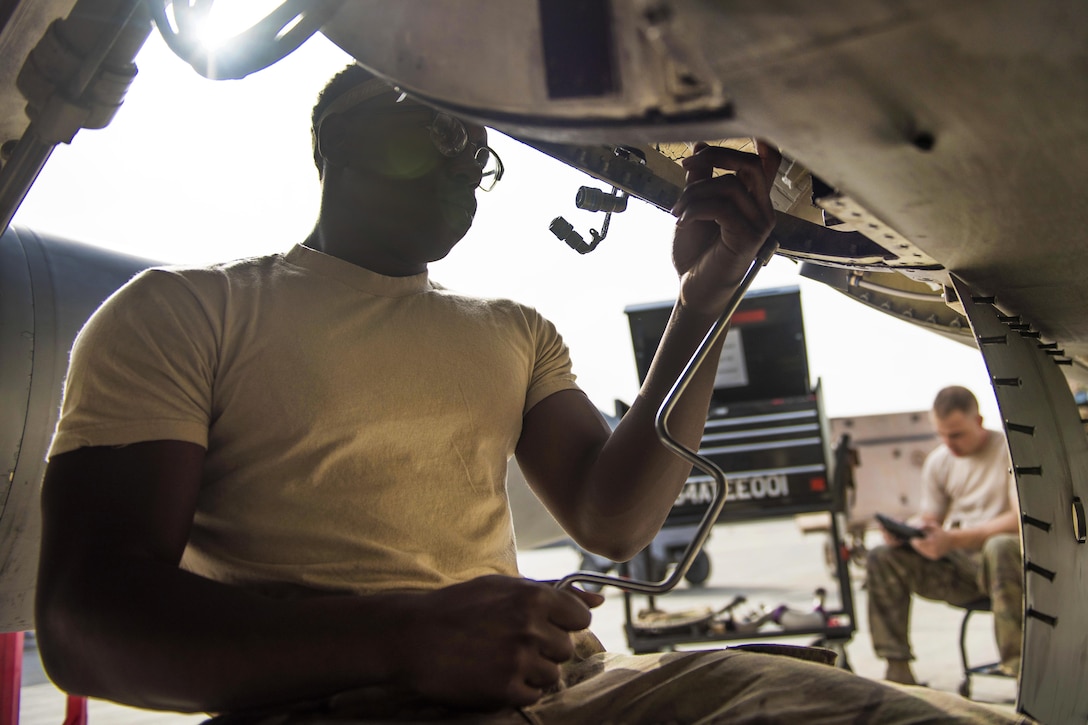 Air Force Airman 1st Class Keion Newman works to repair a heat exchanger on an F-16C Fighting Falcon aircraft at Bagram Airfield, Afghanistan, Oct. 5, 2016. Newman is an electrical and environmental systems specialist assigned to the 455th Expeditionary Aircraft Maintenance Squadron. Air Force photo by Senior Airman Justyn M. Freeman