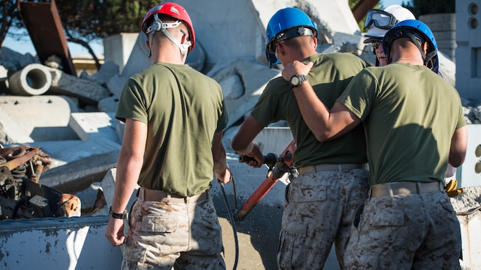 Marines from I Marine Expeditionary Force joined firefighters from the San Francisco area to learn about urban search and rescue techniques Oct. 5, 2016 at building 600 on Treasure Island. The service members learned how to cut through concrete and metal bars, reinforce structures, and move 3-5,000 pounds of concrete with wooden sticks.

 161005-M-KA224-212
