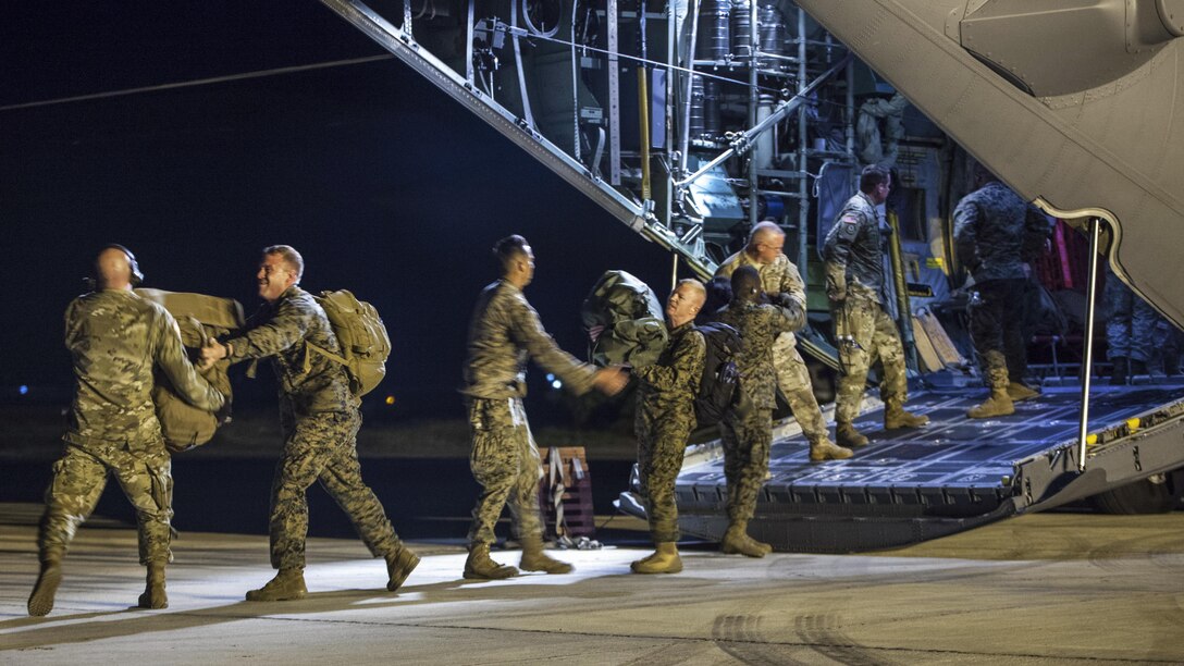 <strong>Photo of the Day: Oct. 6, 2016</strong><br/><br />
Marines and soldiers unload an Ohio Air National Guard C-130H Hercules after arriving in Port-au-Prince, Haiti, Oct. 5, 2016, to support the humanitarian assistance and disaster relief effort arising from Hurricane Matthew. The troops are part of Joint Task Force Matthew, a U.S. Southern Command-directed response team. Marine Corps photo by Sgt. Adwin Esters
<br/><br /><a href="http://www.defense.gov/Media/Photo-Gallery?igcategory=Photo%20of%20the%20Day"> Click here to see more Photos of the Day. </a>