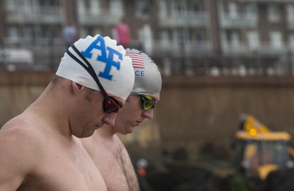 Majors Casey Bowen (left) and Simon Ritchie, both Air Force Academy graduates, prep for a practice swim, Sept. 22, 2016, in Dover Harbor, UK. Bowen and Ritchie traveled to the UK to swim the English Channel. (DOD News photo by Tech. Sgt. Brian Kimball)