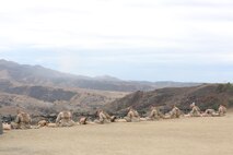 Marines with Company A, Infantry Training Battalion, School of Infantry-West (SOI-W), prepare to fire the M2A1 .50 caliber heavy machine gun as part of their basic infantry training Sept. 20, 2016, at Marine Corps Base Camp Pendleton, Calif. The M2A1 is new to the Marine Corps and has set headspace and timing which is an upgrade from the older M1A1 which requires manual adjustments. SOI-West trains riflemen, infantrymen and assault amphibian crewman in MOS skills across the infantry training continuum. (Offical Marine Corps photo by Lance Cpl. Joseph A. Prado/released)