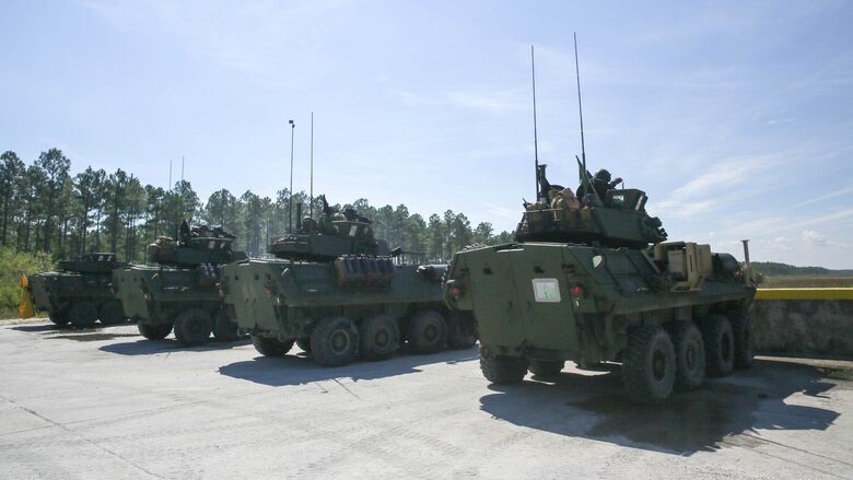 Light-armored vehicles, or LAV-25’s, stand in front of the firing line before Marines with various Light Armored Reconnaissance Battalions battle sight zero their weapons for the first-ever Bushmaster Challenge at range SR-7 at Marine Corps Base Camp Lejeune, North Carolina, Oct. 3, 2016. The competition consists of four light armored vehicles, or LAV-25’s, shooting at targets with an M242 Bushmaster, which is a 25 mm chain-driven autocannon used extensively by the U.S. military, and the M240 coaxial machine gun. 