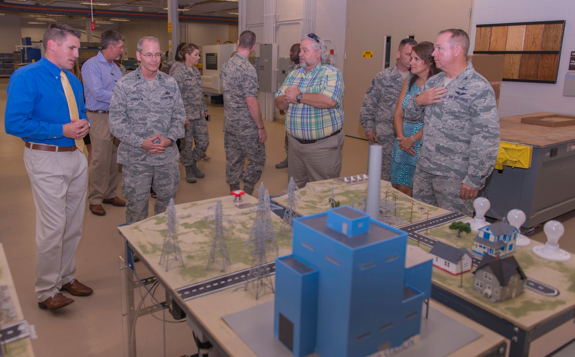 Tomme Lassabe, 81st Training Support Squadron training technology flight chief, showcases the capabilities of the Trainer Development Center to Maj. Gen. Robert LaBrutta, 2nd Air Force commander, during an immersion tour Sept. 22, 2016, on Keesler Air Force Base, Miss. The tour allowed LaBrutta to become familiar with the 81st Training Wing mission, operations and personnel. (U.S. Air Force photo by Andre Askew/Released)