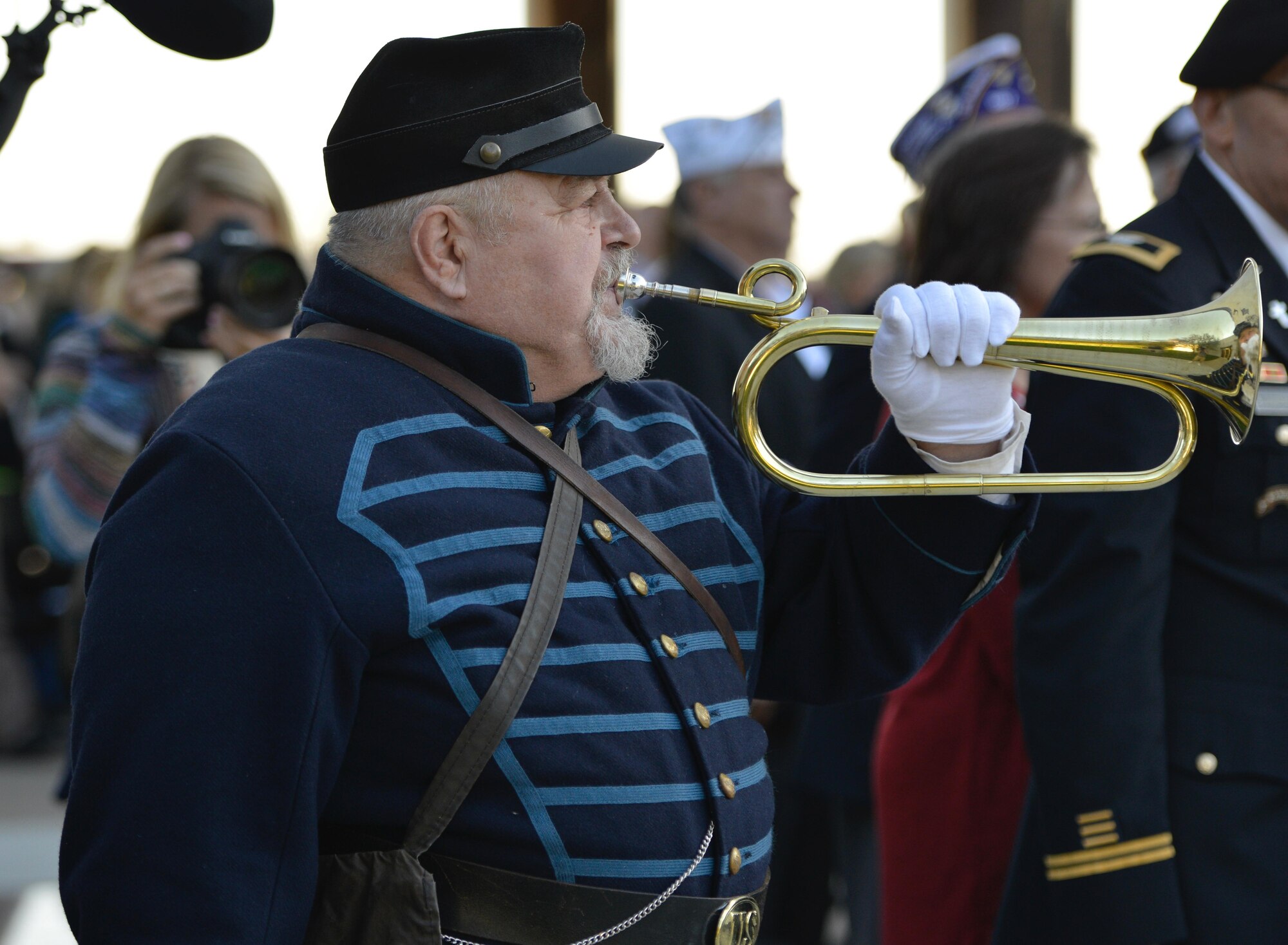 Bill Crowder plays retreat following the ceremony at the Minnesota Medal of Honor Memorial groundbreaking ceremony Oct. 3.