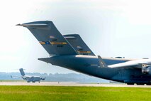 A C-17 Globemaster III from Joint Base Charleston, South Carolina, taxi's on the runway at Wright-Patterson Air Force Base, Ohio, Oct. 5, 2016. The C-17 was one of several planes using Wright-Patterson AFB as a Safe Haven while Hurricane Matthew threatens their home station. (U.S. Air Force photo by Wesley Farnsworth)