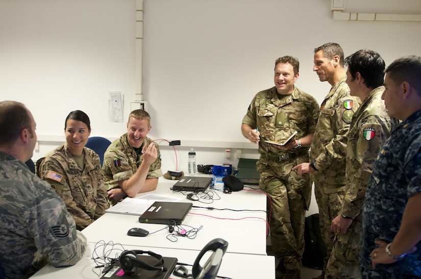 British troops from 102 Logistic Brigade brief their counterparts in the 79th Sustainment Command (Support), 143rd Sustainment Command (Expeditionary), along with members of the Italian army, the U.S. Air Force, and the U.S. Navy during Exercise Lion Focus '16 Sept. 19, 2016, in Vicenza, Italy. (U.S. Army photo by Sgt. 1st Class Alexandra Hays, 79th Sustainment Command (Support).