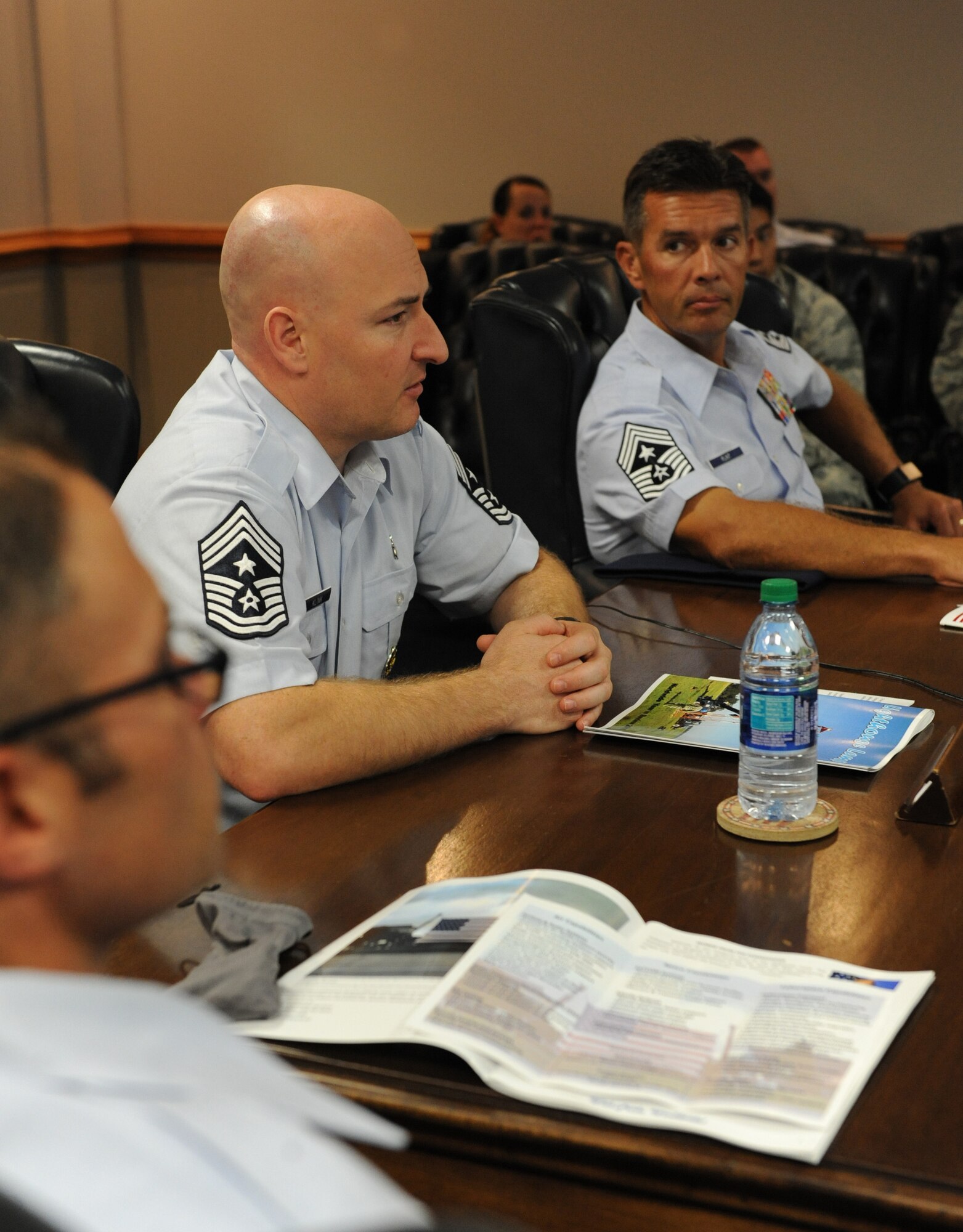 Chief Master Sgt. David Klink, 24th Air Force command chief, Lackland Air Force Base, Texas, asks questions during an 85th Engineering Installation Squadron mission briefing at Maltby Hall during a site visit Oct. 3, 2016, on Keesler Air Force Base, Miss. The 24th AF leadership visited Keesler to familiarize themselves with how the Air Force trains Airmen in the cyber career field. (U.S. Air Force photo by Kemberly Groue/Released)