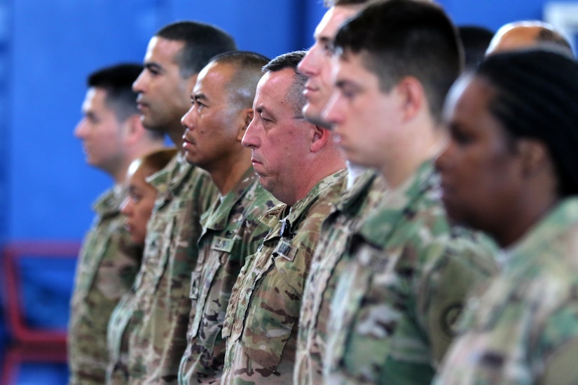 Third Army Augmentation Company stands in formation during the final casing of its colors during an inactivation ceremony at Camp Arifjan, Kuwait, September 28, 2016. The company has deployed U.S. Army Reserve Soldiers to support U.S. Army Central for the past 27 years during Operation Desert Storm and Shield, Operation Enduring Freedom, Operation Iraqi Freedom and Operation Inherent Resolve, as well as other campaigns. (U.S. Army photo by Sgt. Brandon Hubbard, USARCENT Public Affairs)