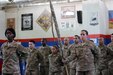 The Third Army Augmentation Company Commander, Capt. Doreen D. Fuller, left, and Guideon bearer, Spc. Ashleigh Palumbo, right, stand in formation with the cased colors during an inactivation ceremony for the U.S. Army Central unit at Camp Arifjan, Kuwait, September 28, 2016. The company has deployed 60 detachments of 50-plus Army Reserve Soldiers since Sept. 11, 2001 to the Central Command theater of operations. (U.S. Army photo by Sgt. Brandon Hubbard, USARCENT Public Affairs)