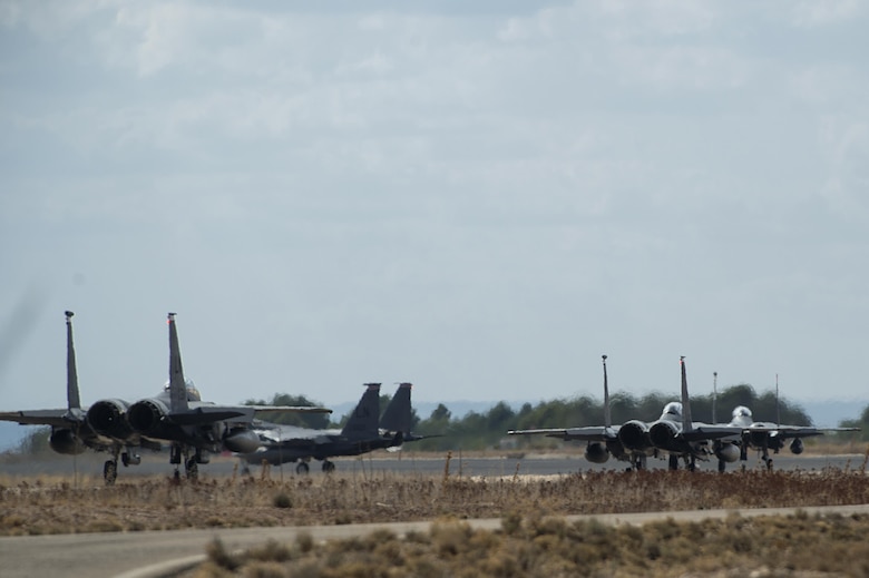 F-15E Strike Eagles, assigned to the 494th Fighter Squadron from Royal Air Force Lakenheath, England, taxi for a sortie in support of Tactical Leadership Programme 16-3 at Los Llanos Air Base, Spain, Sept. 26. Training programs like TLP showcase how the U.S. works side-by-side with NATO Allies and partners every day, training to meet future security challenges as a unified force. (U.S. Air Force photo/ Staff Sgt. Emerson Nuñez)