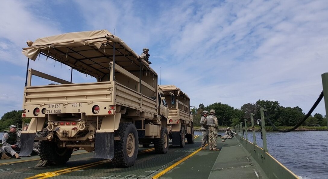 FORT MCCOY, Wis. – U.S. Army Reserve Soldiers, with the 705th Transportation Company, 643rd Regional Support Group, 310th Sustainment Command (Expeditionary) from Dayton, Ohio, and the 652nd Multi-Role Bridge Company (MRBC), 397th Engineer Battalion, 372nd Engineer Brigade, 416th Theater Engineer Command, from Hammond, Wis., work together to conduct rafting operations while participating in Combat Support Training Exercise (CSTX) 86-15-03, at Lake Petenwell outside of Fort McCoy, Wis., August 19, 2016. Nearly 9,000 service members from across the country participated in CSTX 86-16-03 hosted by the 86th Training Division.