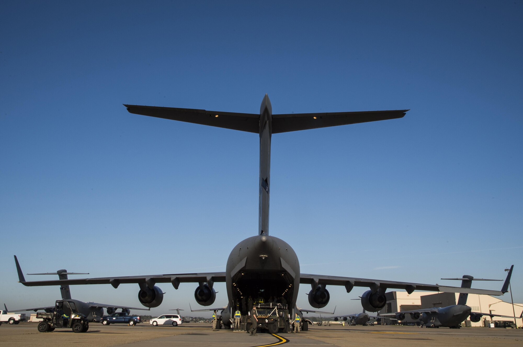 Members of the 621st Contingency Response Wing load equipment onto a C-17 Globemaster III at Joint Base McGuire-Dix-Lakehurst, N.J. before departing to support humanitarian relief efforts at Port-au-Prince, Haiti, October 6, 2016. More than 30 members of the CRW deployed in response to Hurricane Matthew. (U.S. Air Force photo by Tech. Sgt. Gustavo Gonzalez/Released)