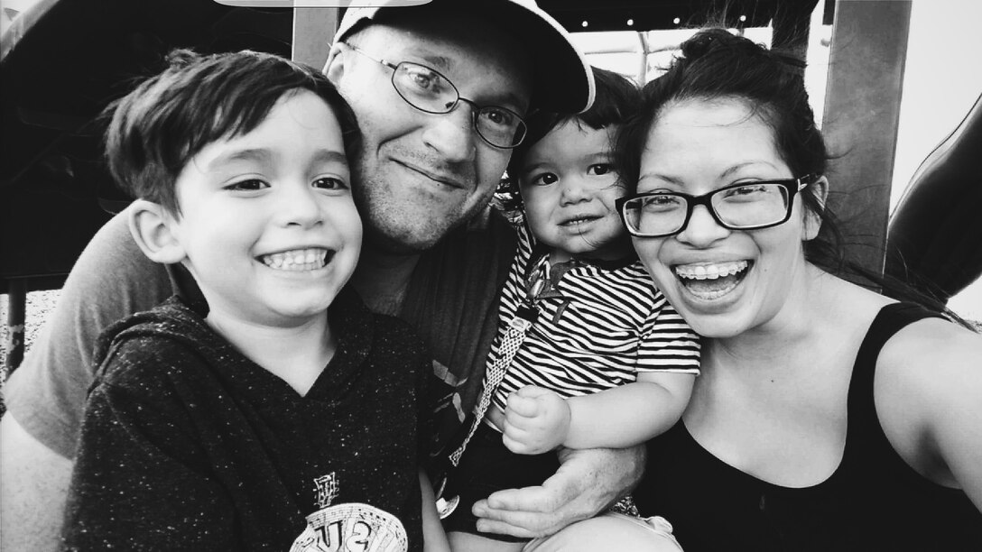 Shannon takes a photo with her oldest son Lucas, left, husband, U.S. Air Force Staff Sgt. Christopher Spalding, 7th Component Maintenance Squadron aerospace propulsion craftsman, and youngest son Logan. Shannon was diagnosed with stage 1 triple negative breast cancer, March 3, 2010 and has been cancer-free for six years. 