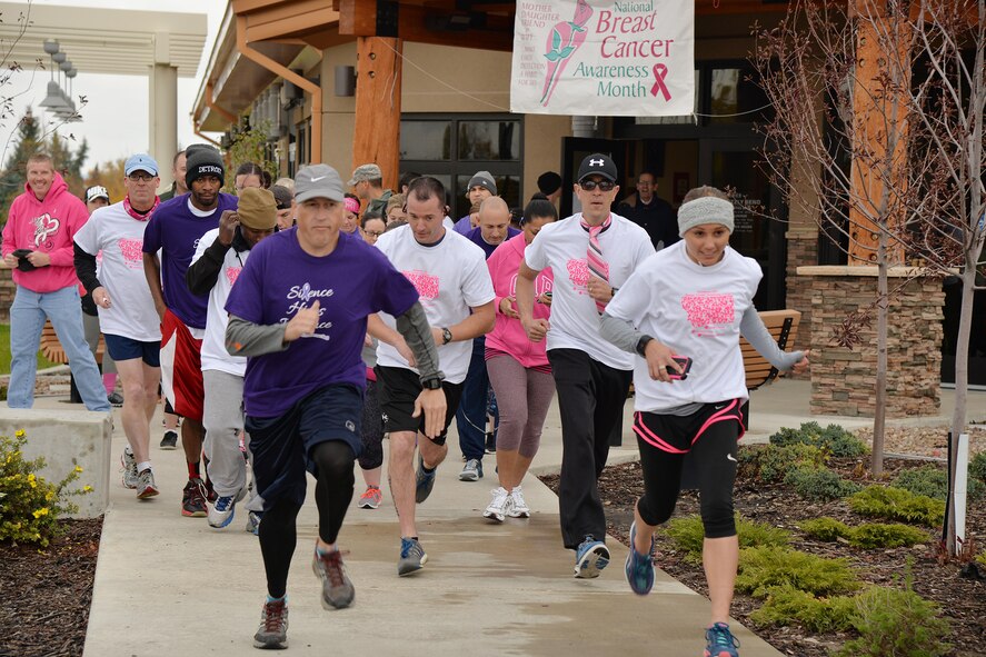 Members of Team Malmstrom participate in an annual Breast Cancer Awareness run and walk Oct. 5, 2016, at Malmstrom Air Force Base, Mont. The race started at the Grizzly Bend where participants were able to run and walk the 1.2 mile course around the base. (U.S. Air Force photo/Airman 1st Class Daniel Brosam)