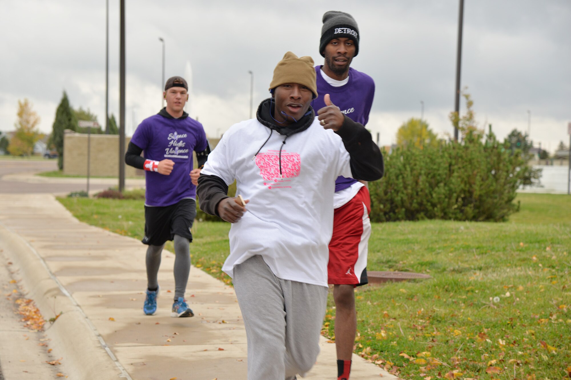 Members of Team Malmstrom participate in an annual Breast Cancer Awareness run and walk Oct. 5, 2016, at Malmstrom Air Force Base, Mont. After the run, participants were able to enjoy free food and refreshments while they listened to guest speaker Jodi Dake share her personal experience with breast cancer. (U.S. Air Force photo/Airman 1st Class Daniel Brosam)