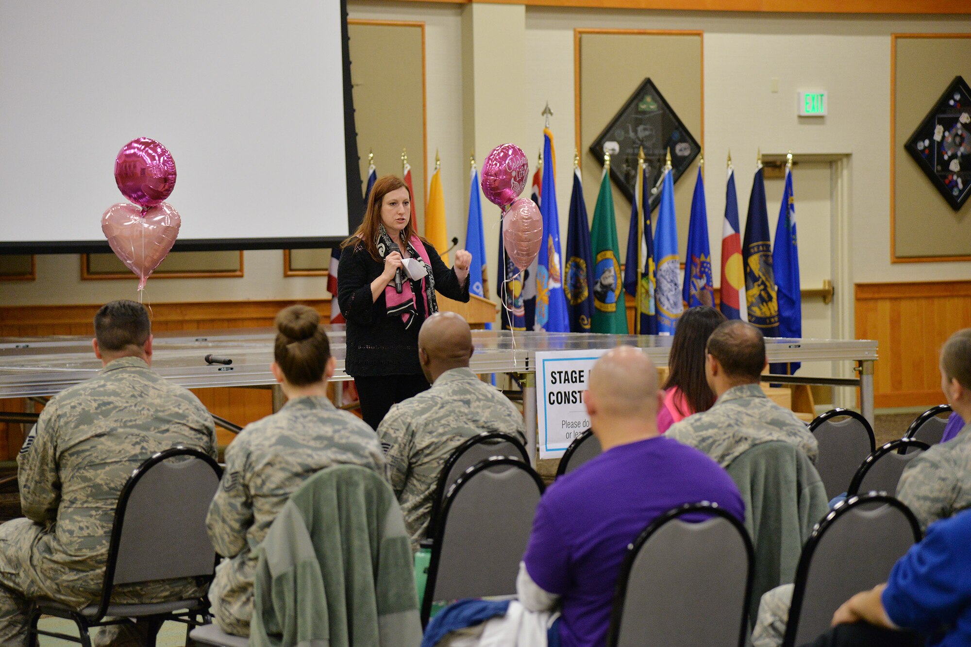 Jodi Dake, a breast cancer survivor, shares her personal encounter with breast cancer after the Breast Cancer Awareness run and walk Oct. 5, 2016, at Malmstrom Air Force Base, Mont. Dake was diagnosed with breast cancer at the age of 31, underwent treatment and has been cancer-free for seven years. (U.S. Air Force photo/Airman 1st Class Daniel Brosam)