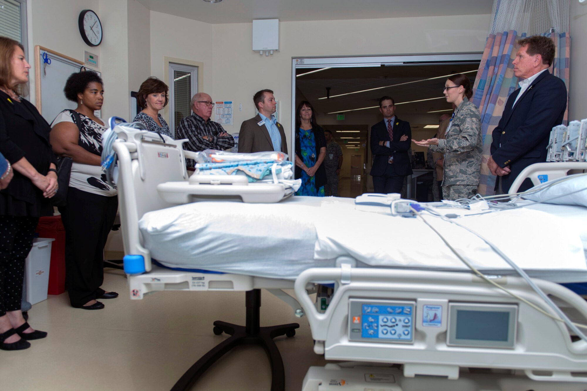 Capt. Davi Smith, 81st Inpatient Operation Squadron critical care nurse, briefs honorary commanders about the daily tasks of the intensive care unit at the Keesler Medical Center Sept. 29, 2016, on Keesler Air Force Base, Miss. The honorary commanders, who are local civilian civic and business leaders, toured the physical therapy clinic, emergency room and intensive care unit to learn more about the capabilities and mission of the 81st MDG. (U.S. Air Force photo by Andre’ Askew/Released)
