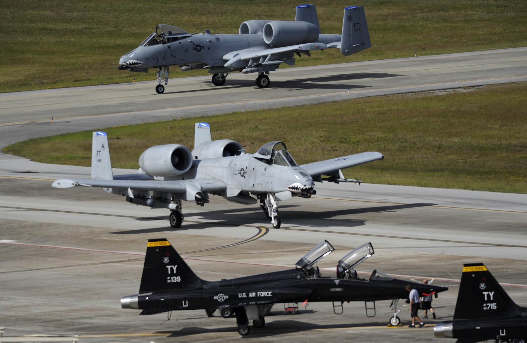 Two U.S. Air Force A-10C Thunderbolt IIs from Moody Air Force Base, Ga., taxi down the flightline at Tyndall Air Force Base, Fla., Oct. 6, 2016. Approximately 30 aircraft were ordered to evacuate after officials at the 23rd Wing assessed the threat of Hurricane Matthew. (U.S. Air Force photo by Senior Airman Solomon Cook/Released)